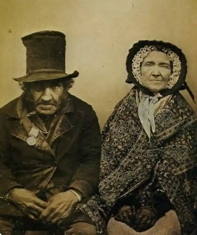 Couple posing for a professional photo in the 1860s
