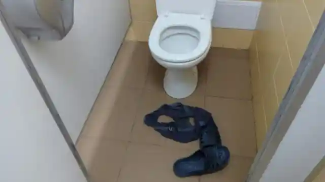 And this is the other way around. Looks like the toilet stole someone right from the office. It only left their shoes and underwear.