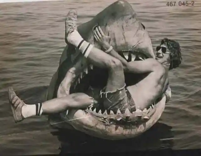 49. Steven Spielberg sits in the mouth of the mechanical shark used in his movie, Jaws.