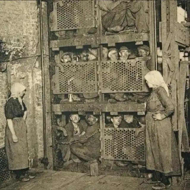 Coal miners coming up after a day of work in 1920s Belgium