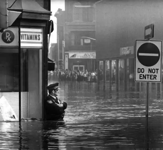 Keeping Guard During The Massive Flood That Hit Cambridge
