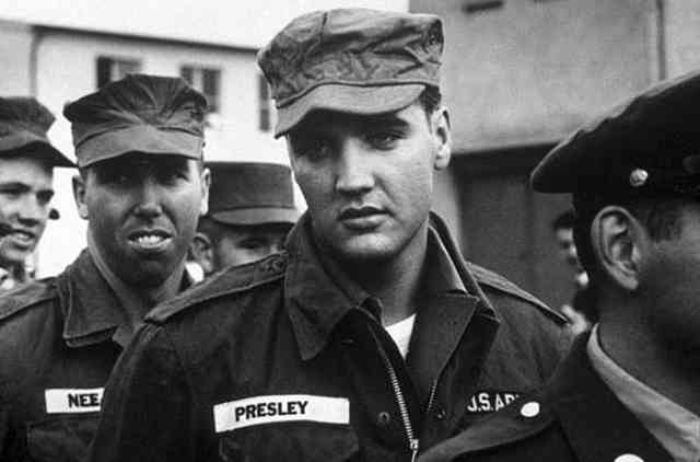 48. Elvis Presley in the Army, 1958.