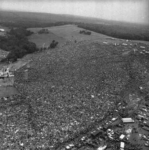 22. Massive crowds gather for Woodstock, 1969.