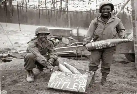 32. Two American soldiers with special ammo for Hitler, Easter Sunday, 1945.