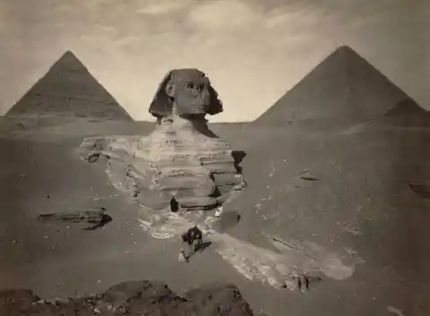 25. Partially excavated Sphinx in Egypt, 1878.
