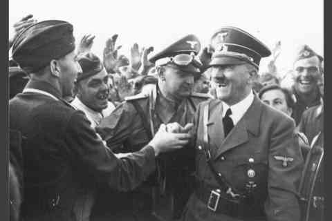 Adolf Hitler laughing at the park